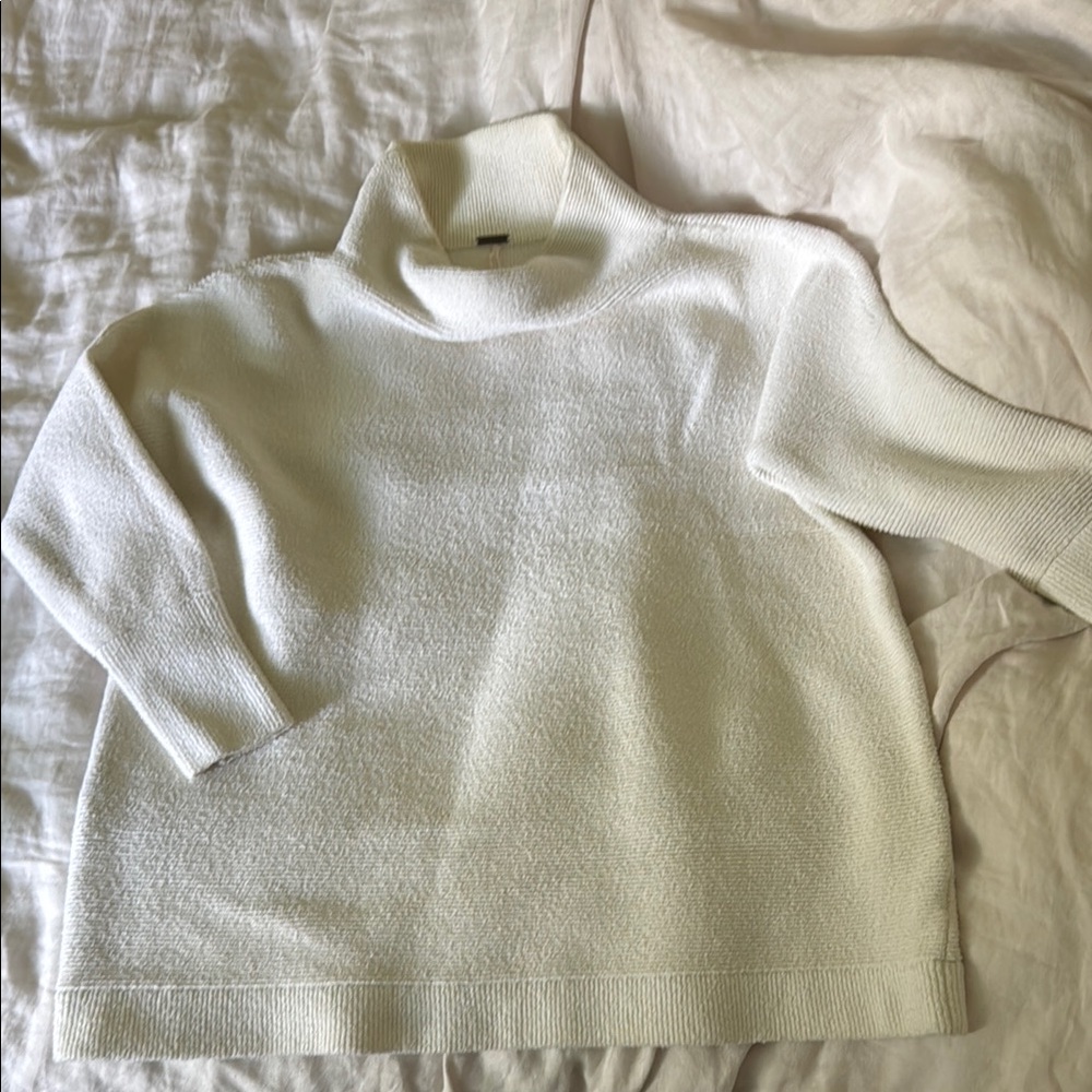 Elegant White Turtleneck Sweater